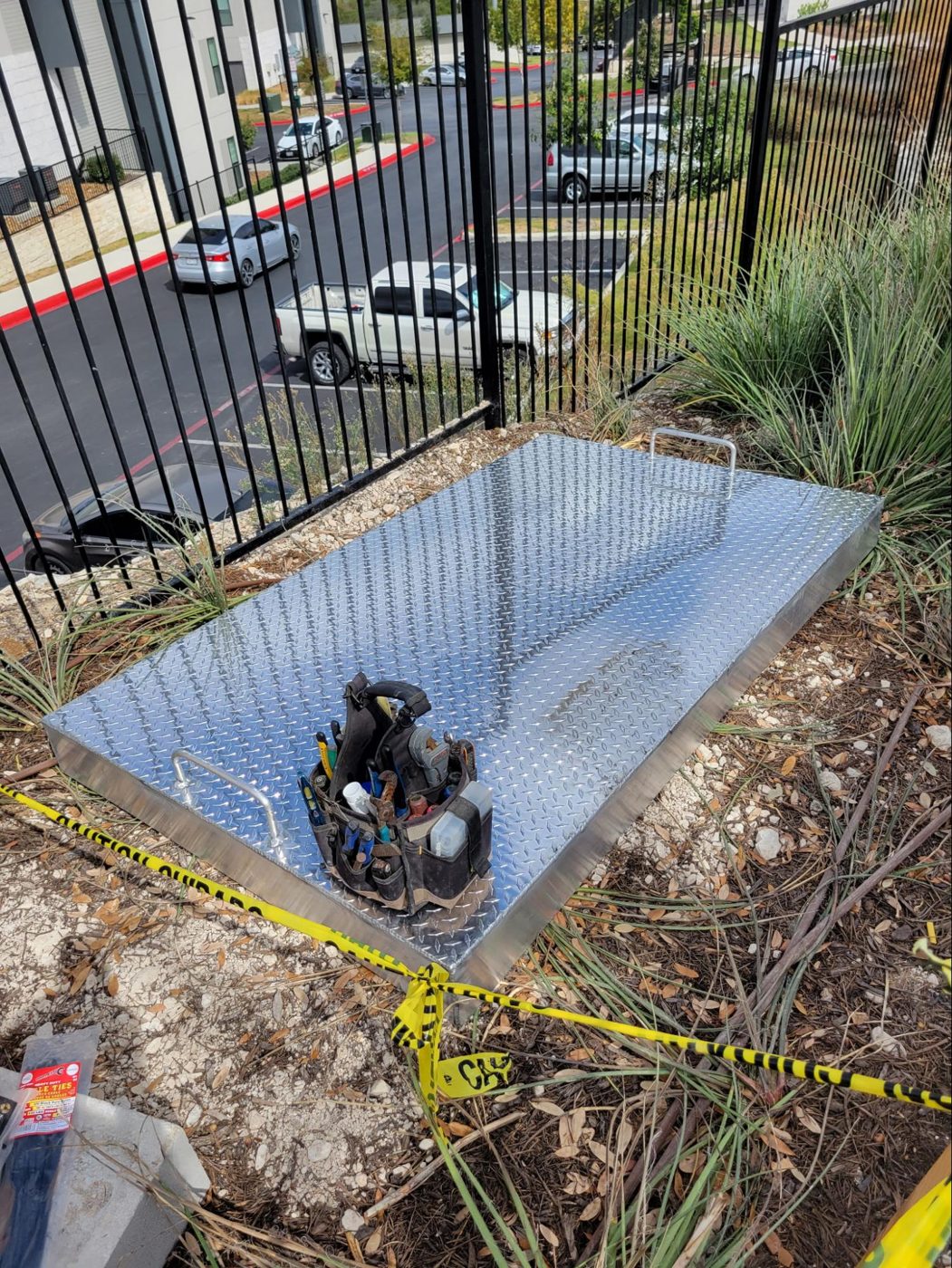 Custom aluminum manhole cover fabricated for a below-grade Liquid Active Armour setup